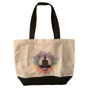 Black & white canvas cotton tote with embroidered Chakra Man design.